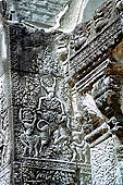 Angkor Wat temple, the fourth enclosure, the bas reliefs of the west gopura, friezes of figurines mounted on a variety of animals 